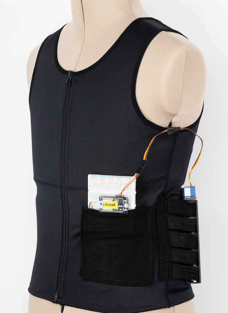 Photo of sensory regulation vest prototype on a mannequin